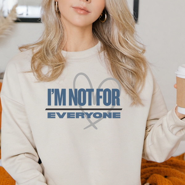 Person wearing a sweatshirt with 'I'm not for everyone' text