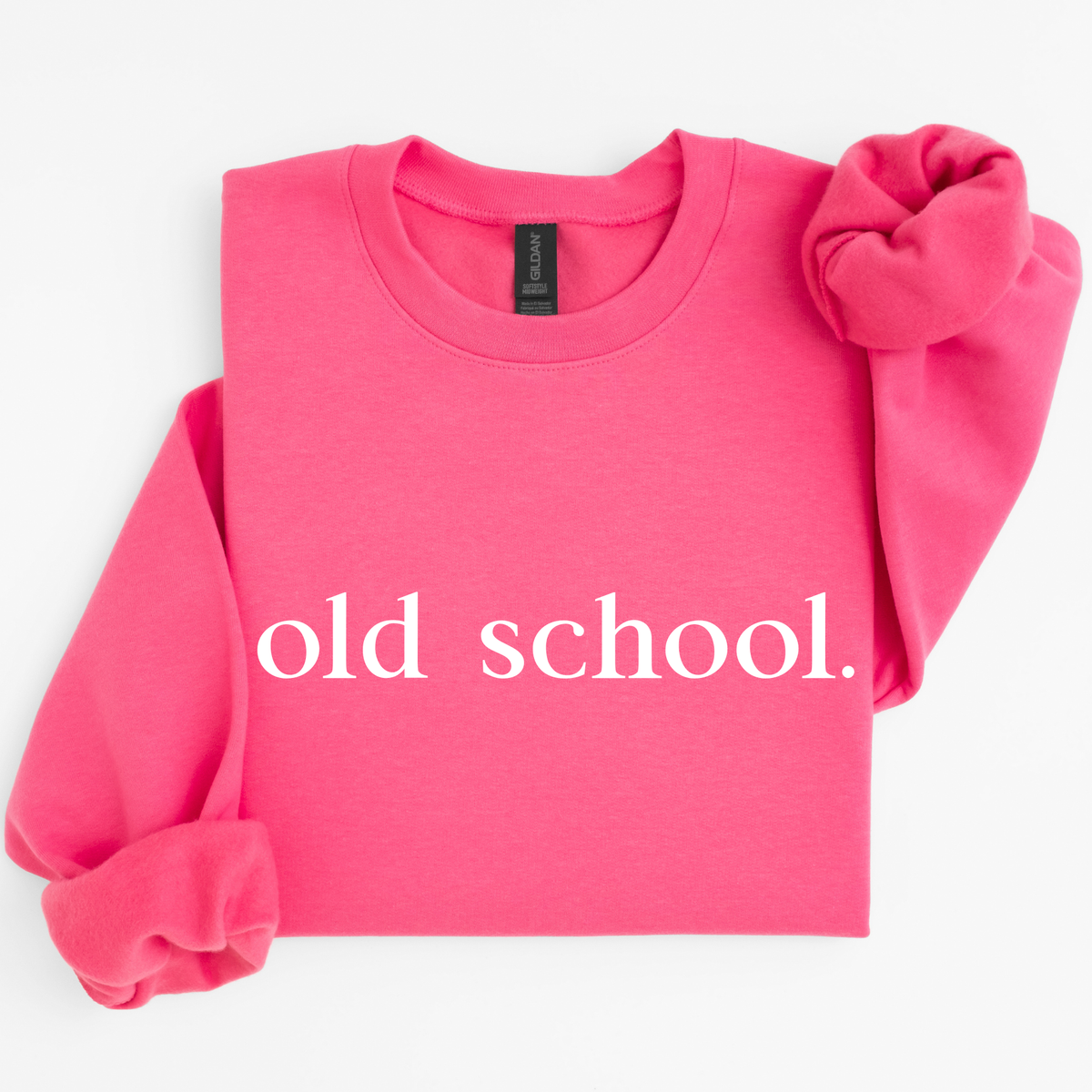 Pink paragon sweatshirt with 'old school.' text on a white background