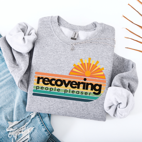 Gray sweatshirt with a colorful graphic and text on a white background