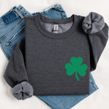 Gray sweatshirt with a green shamrock on a white background