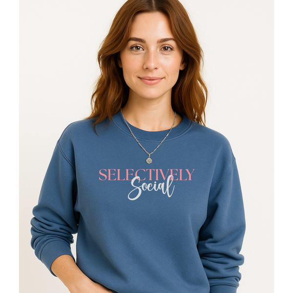 Woman wearing a blue sweatshirt with 'SELECTIVELY Social' text on a plain background