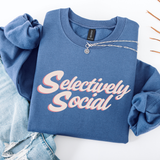 A folded blue sweatshirt with the words 