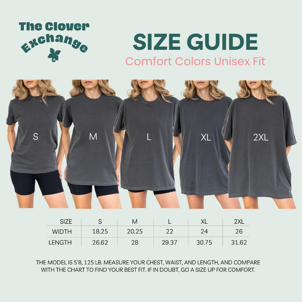 Size guide chart from The Clover Exchange showing five models wearing unisex fit comfort colors t-shirts in sizes S, M, L, XL, and 2XL, with a width and length measurement table below.