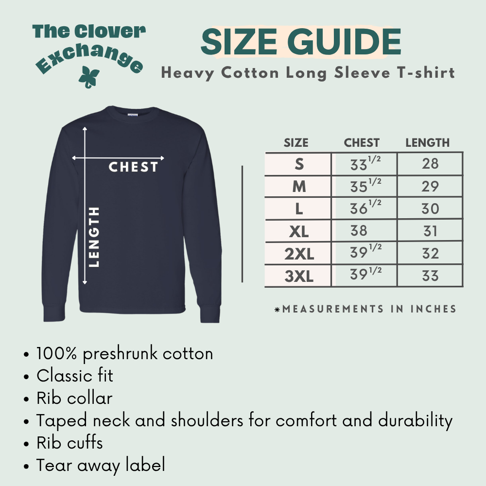 A size guide graphic for a heavy cotton long sleeve T-shirt by The Clover Exchange, showing a navy blue shirt with measurement arrows for chest and length, plus a size chart listing S through 3XL measurements in inches and bullet points about the shirt's features.