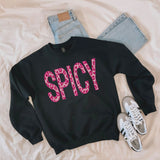 Black Spicy leopard print sweatshirt laid flat with jeans and white sneakers