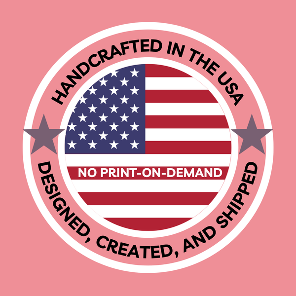 American flag with 'Handcrafted in the USA' text on a pink background. An American Flag circle design that boasts "Handcrafted in the USA - Designed, Created, and Shipped." No print on demand.