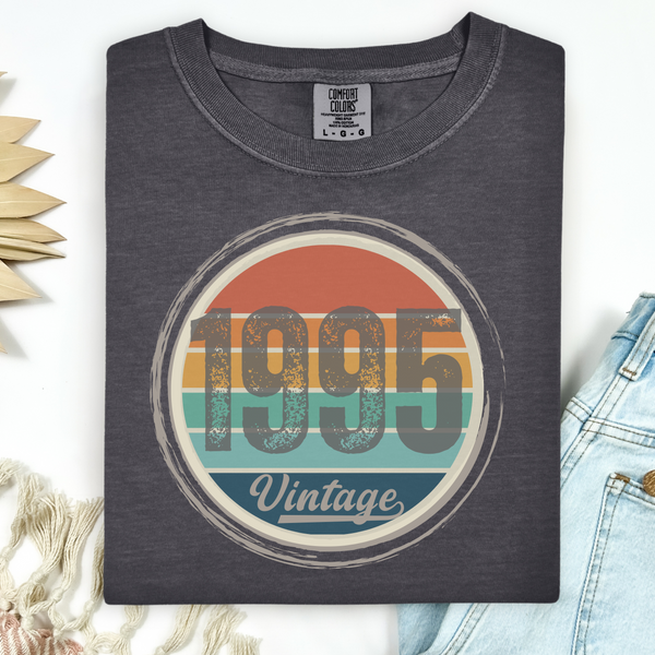 Dark gray t-shirt with '1995 Vintage' design on a white background