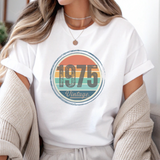 Person wearing a white t-shirt with '1975 Vintage' design.