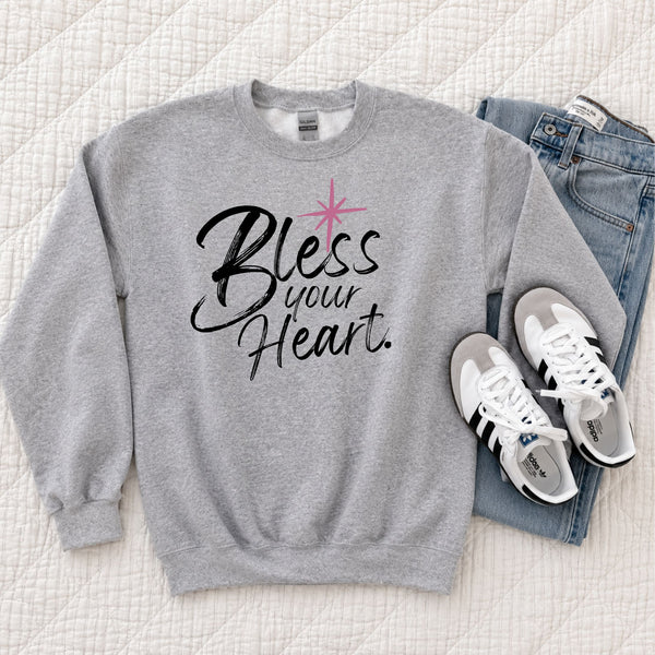 Gray Bless Your Heart sweatshirt laid flat with jeans and white sneakers