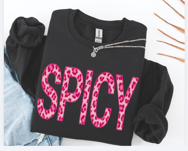 Black sweatshirt with pink 'SPICY' text on a white background