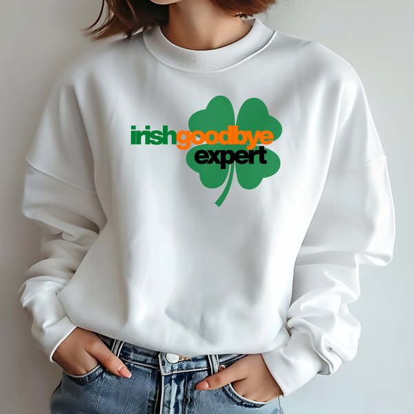 White sweatshirt with 'irish goodbye expert' text and clover graphic on a plain background